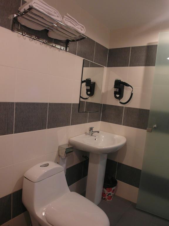 Mcity Inn Miri Cameră foto
