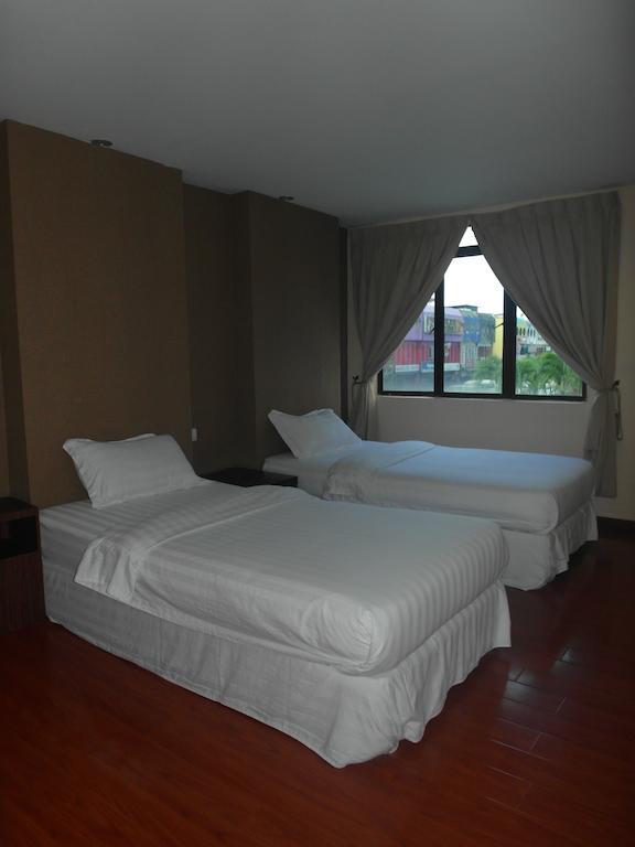 Mcity Inn Miri Cameră foto