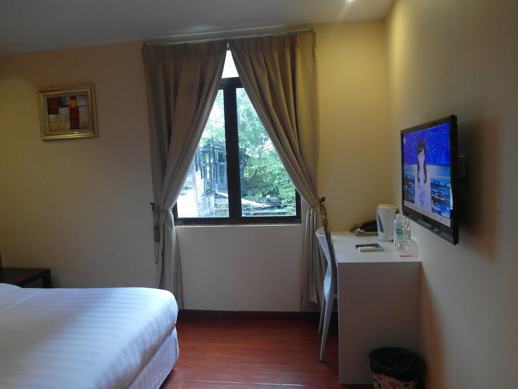 Mcity Inn Miri Cameră foto